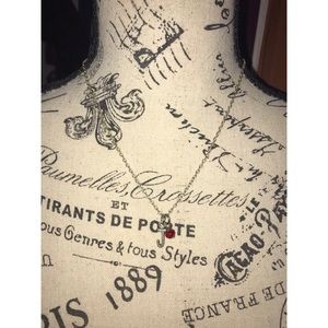 J necklace with red charm